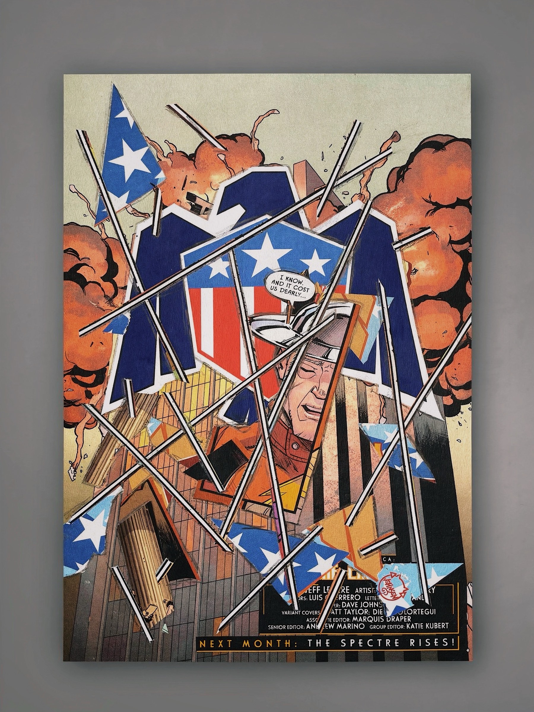 Completed collage mounted upright with central shield and speech fragment reading 'it cost us dearly'.