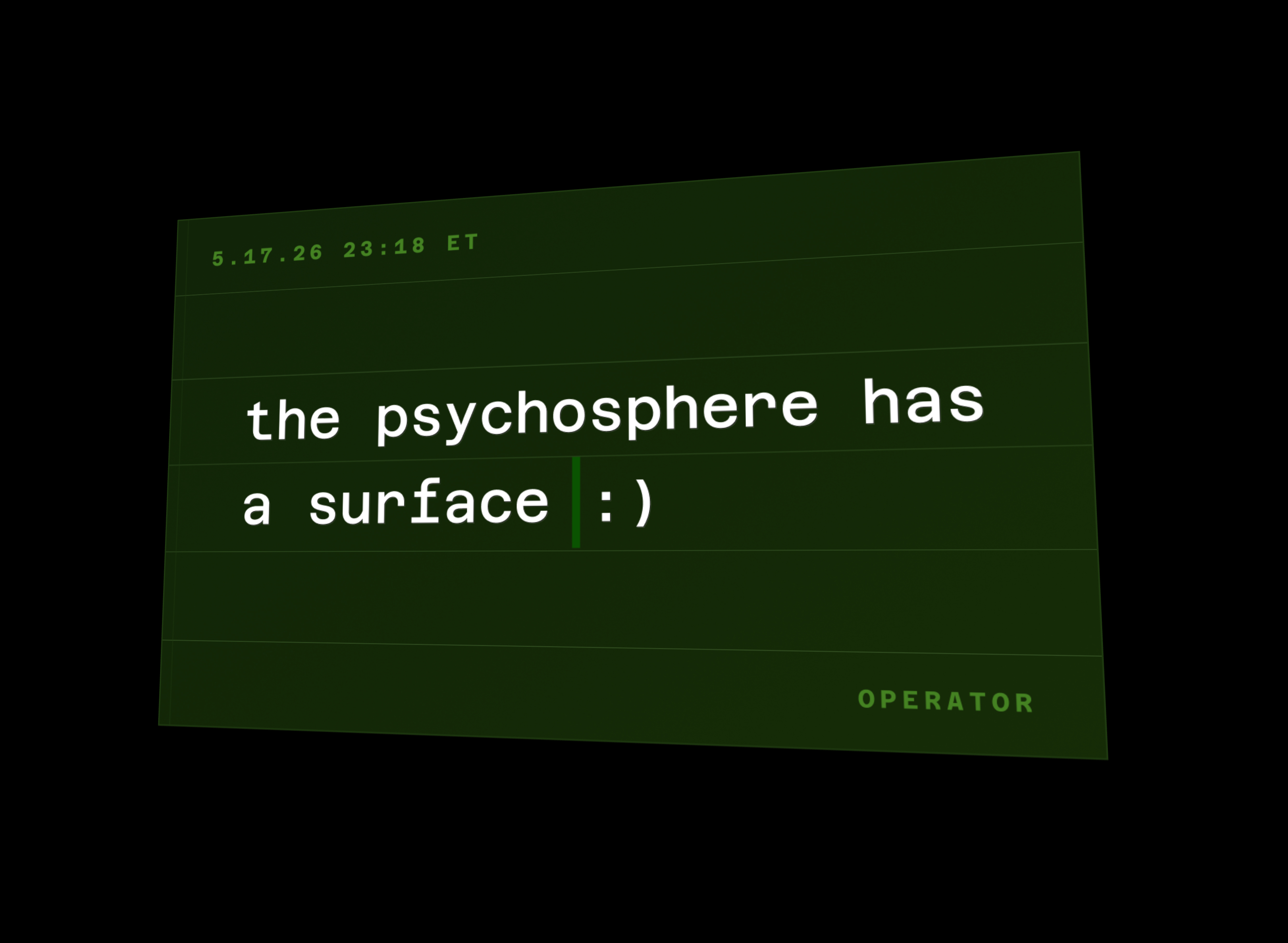 Angled view of the green operator card displaying the phrase 'the psychosphere has a surface :)' against a black background.